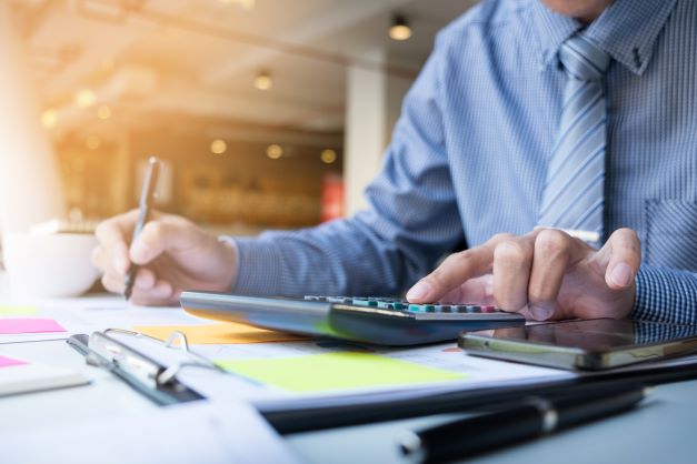 business-finance-man-calculating-budget-numbers-invoices-financial-adviser-working-3